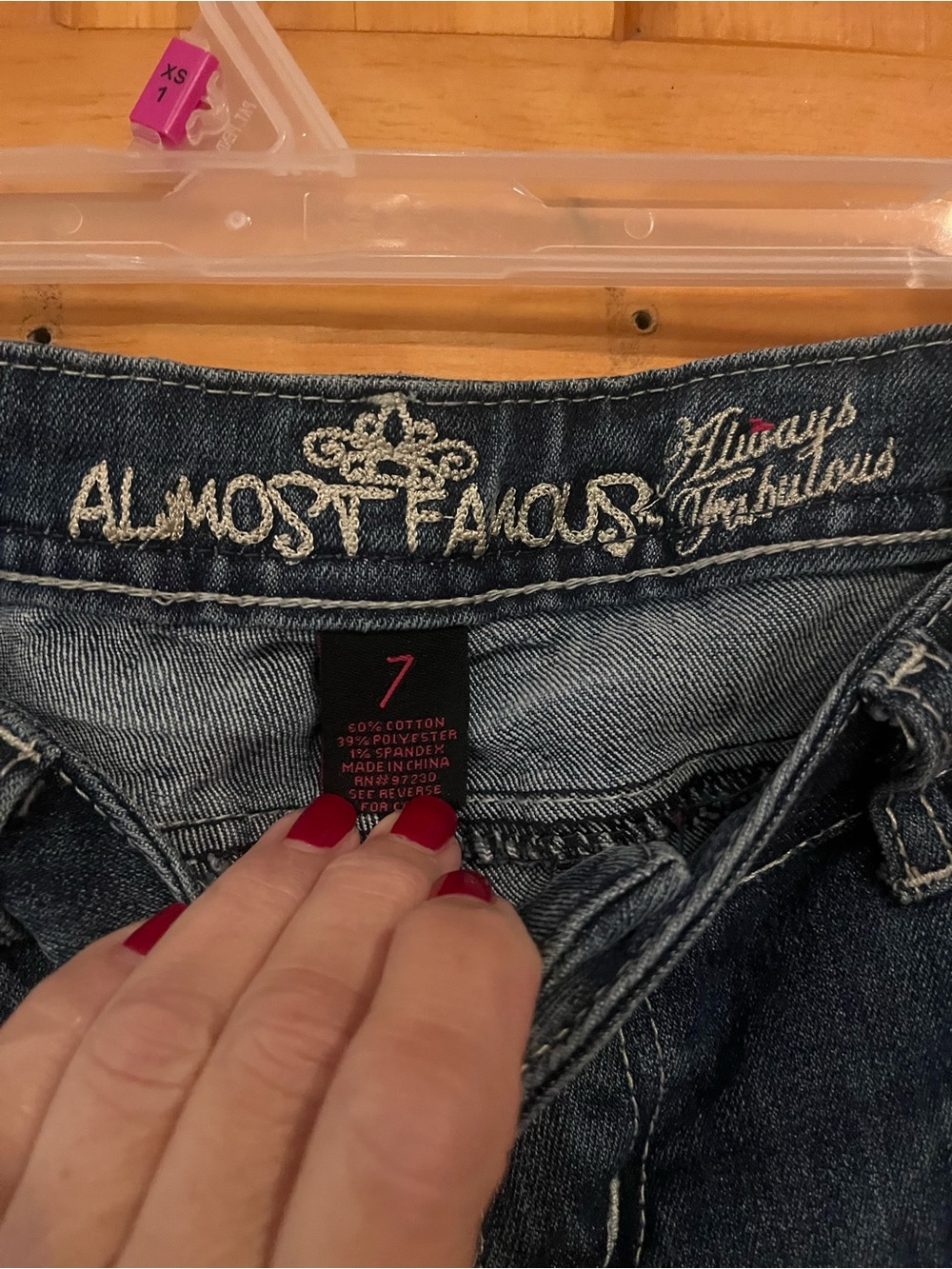 Almost Famous Dark Blue Skinny Jeans with Red & White Flag Accent - Picture 3 of 10